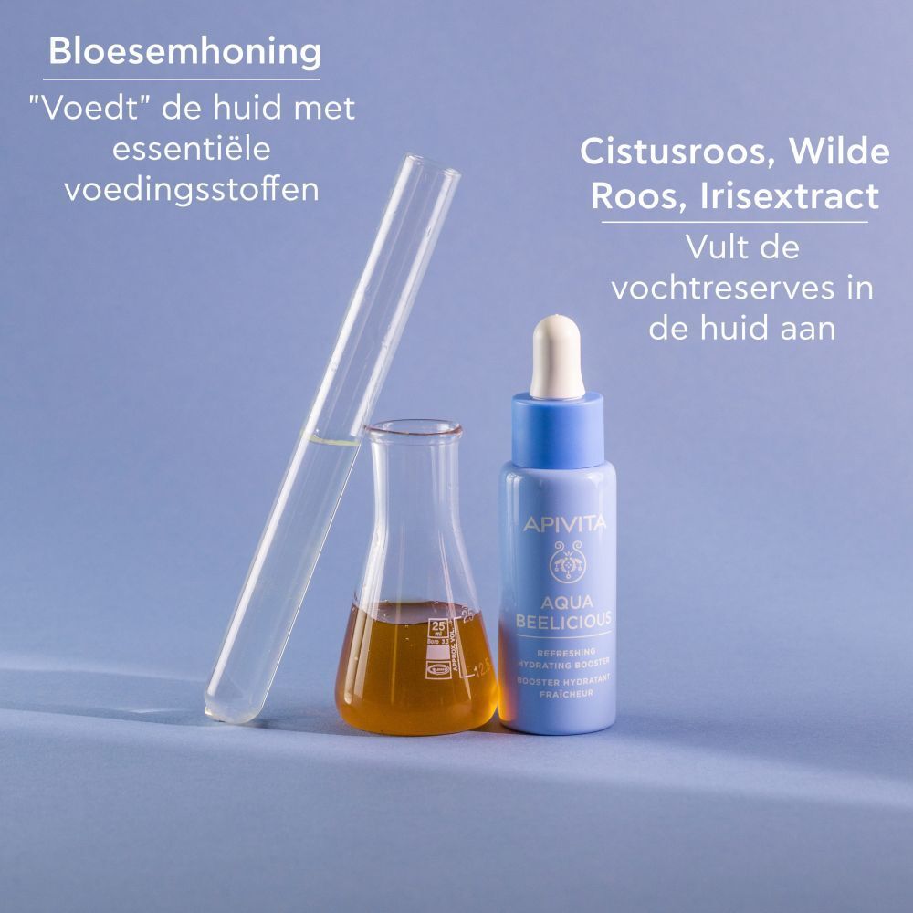 Fles met ingrediënten. Tekst: Bloemenhoning, cistusroos, wilde roos, iris.