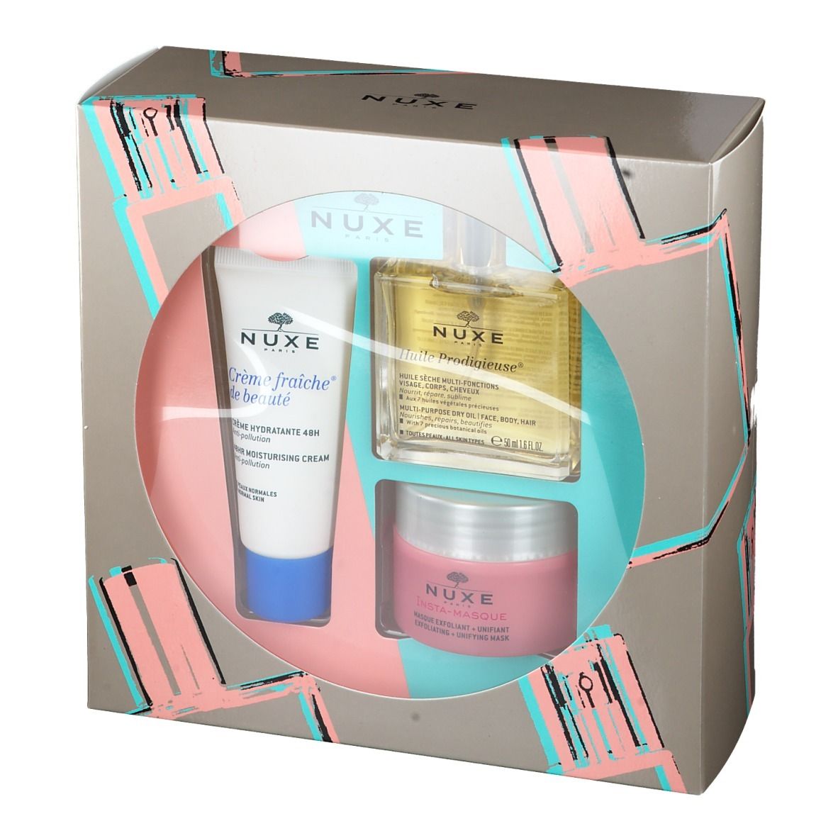 Coffret cadeau NUXE. Contient crème hydratante, huile prodigieuse et masque. Emballage avec logo NUXE. Produits visibles.