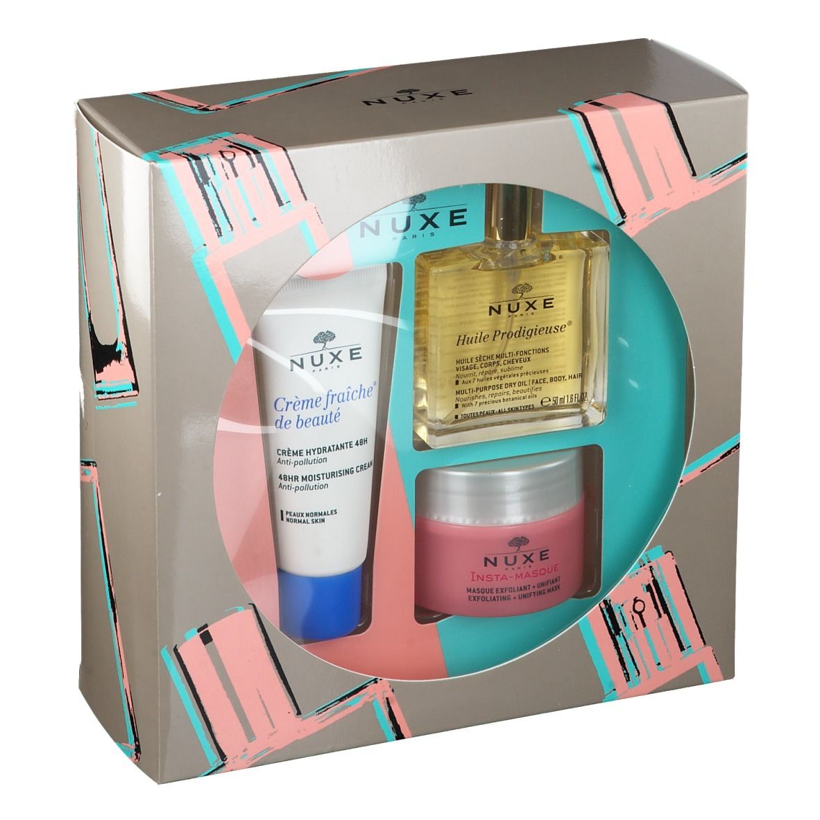 Coffret cadeau NUXE. Contient crème hydratante, huile prodigieuse et masque. Emballage avec logo NUXE. Produits visibles.