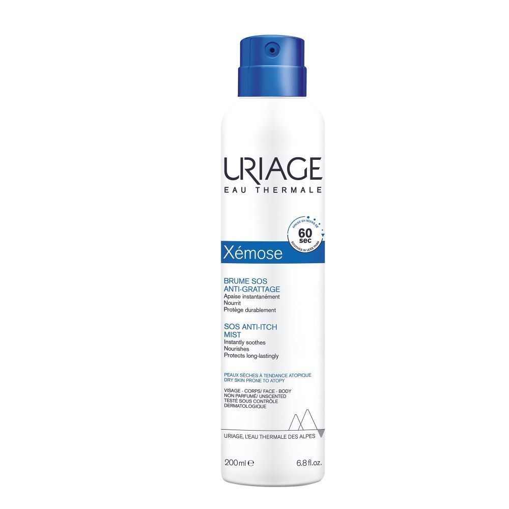 Uriage Xémose spray. Arm besproeid met product. Tekst over gebruik en eigenschappen.