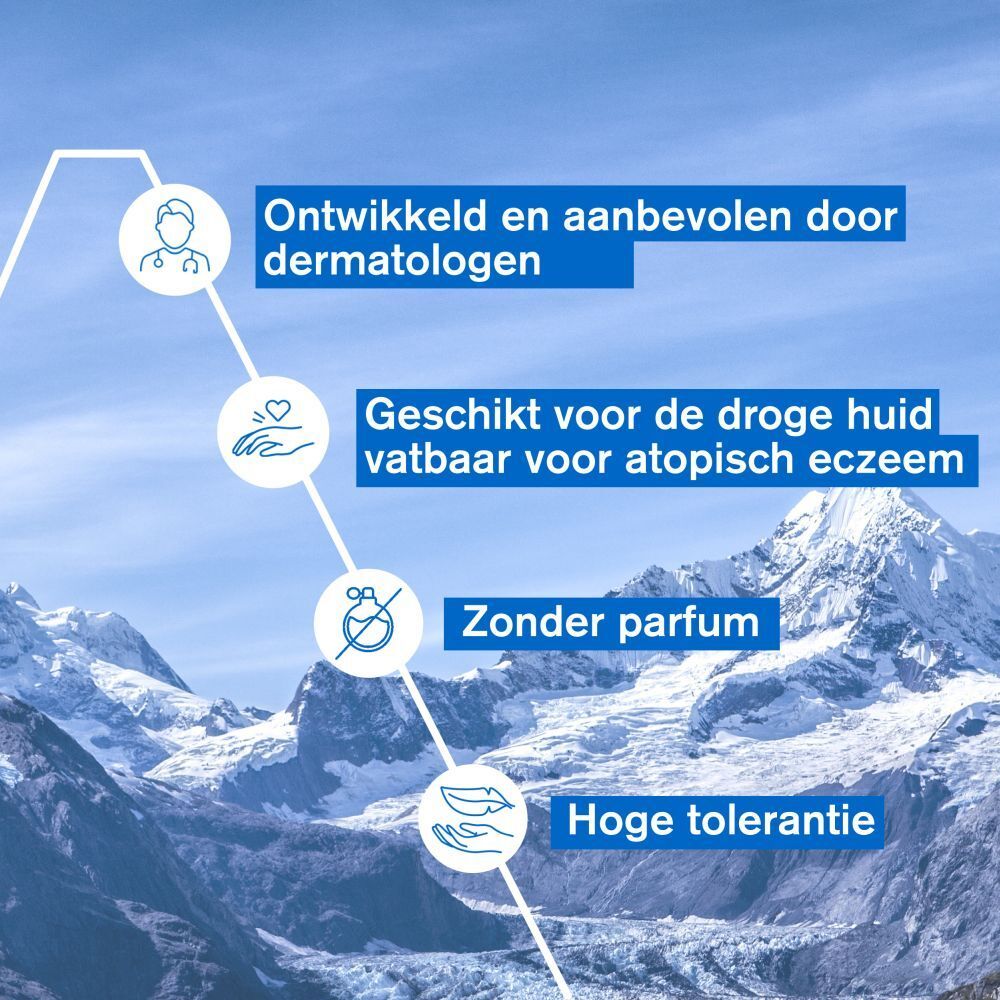 Uriage Xémose Anti-jeuk spray. Witte fles met blauwe sproeikop. Tekst en logo zichtbaar.