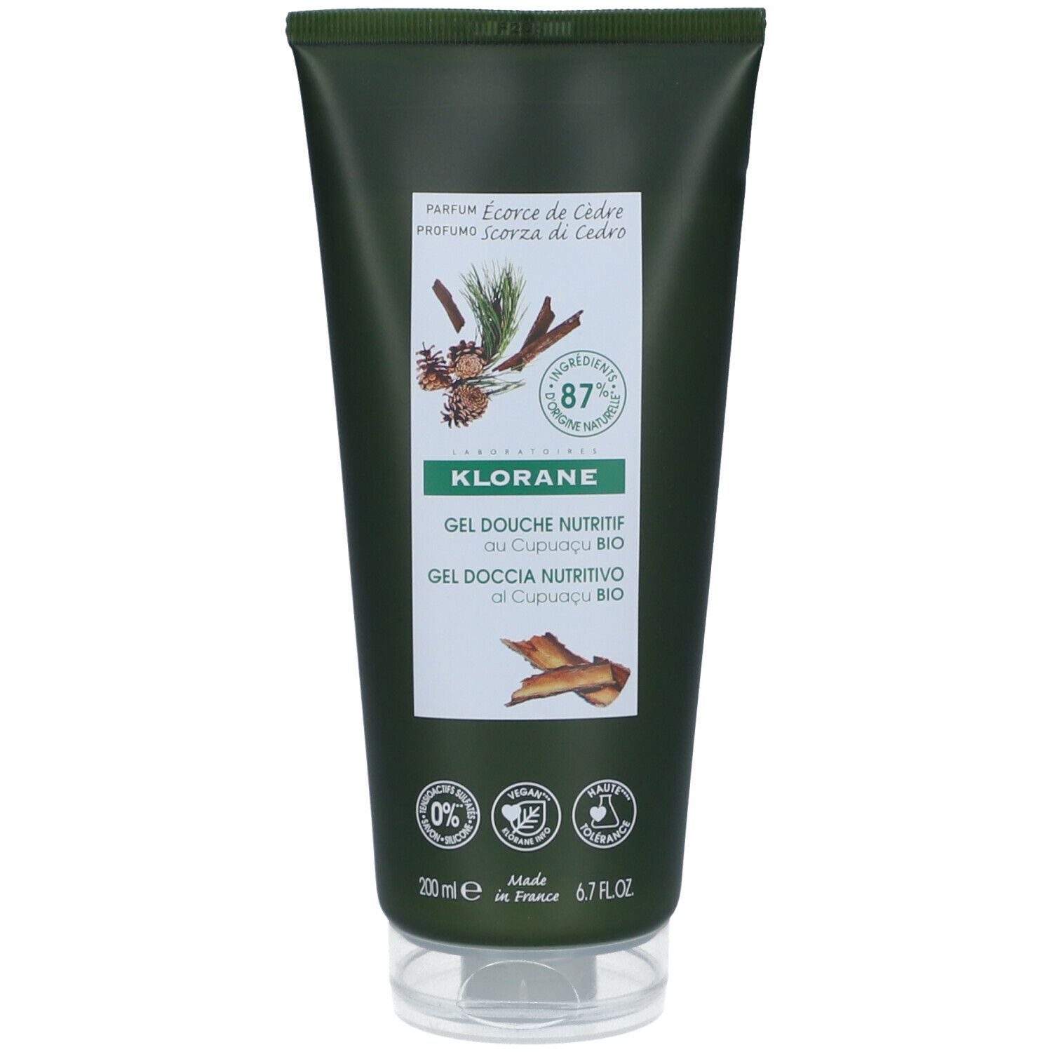 Tube de gel douche KLORANE, écorce de cèdre. Étiquette avec illustrations et ingrédients. 87% d'ingrédients d'origine naturelle.