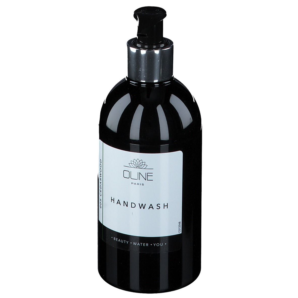 Zwarte fles met pomp. Opschrift: Oline Paris, Handwash. Verticale strepen. Zilveren pomp.