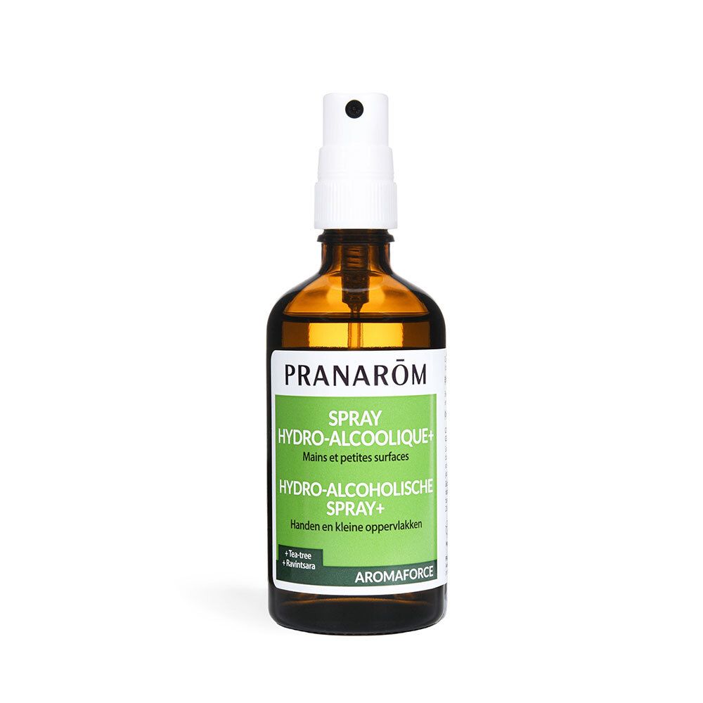 Bruine glazen fles met witte spraykop. Opschrift: PRANARÔM, Spray Hydro-Alcoolique, Aromaforce. Groen-witte etiketten.