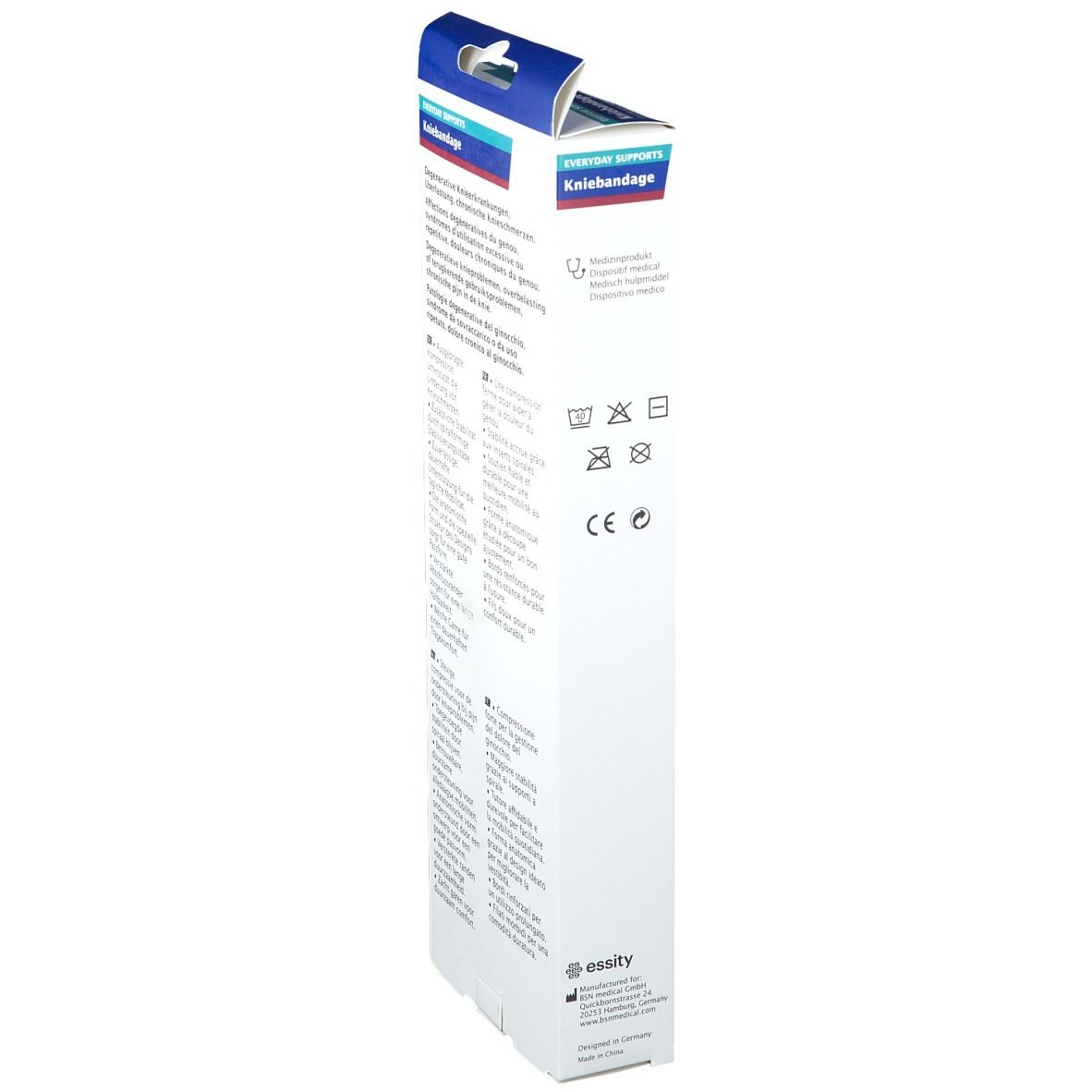 Vue latérale de l'emballage Actimove Kniebandage. Texte : symboles de lavage, marquage CE.
