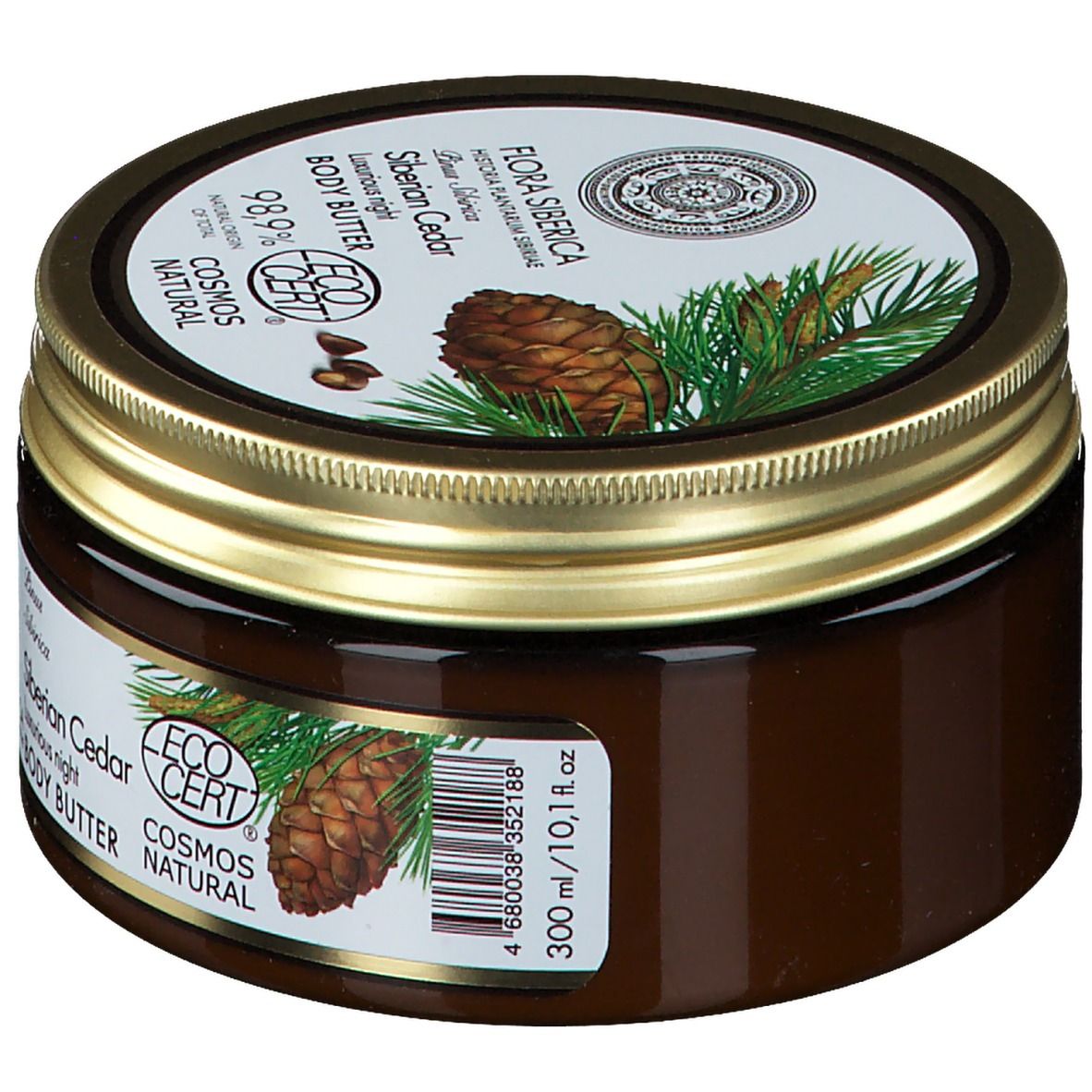 Pot brun avec couvercle doré. Inscription : Flora Siberica, Siberian Cedar Body Butter. Illustration de cônes de pin.