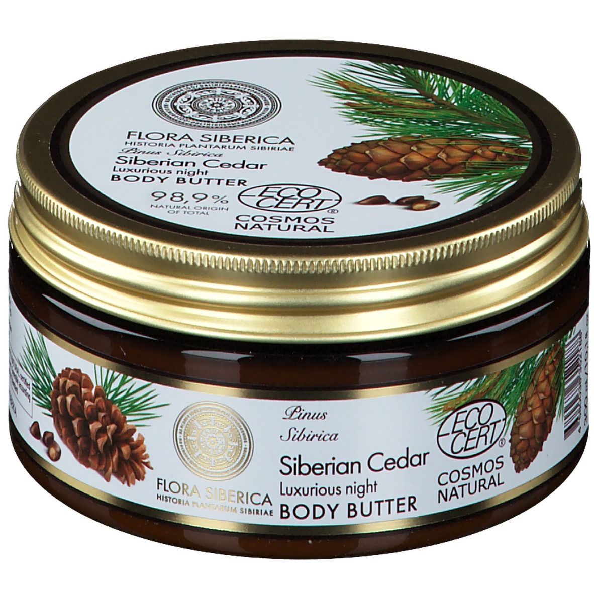 Pot brun avec couvercle doré. Inscription : Flora Siberica, Siberian Cedar Body Butter. Illustration de cônes de pin.