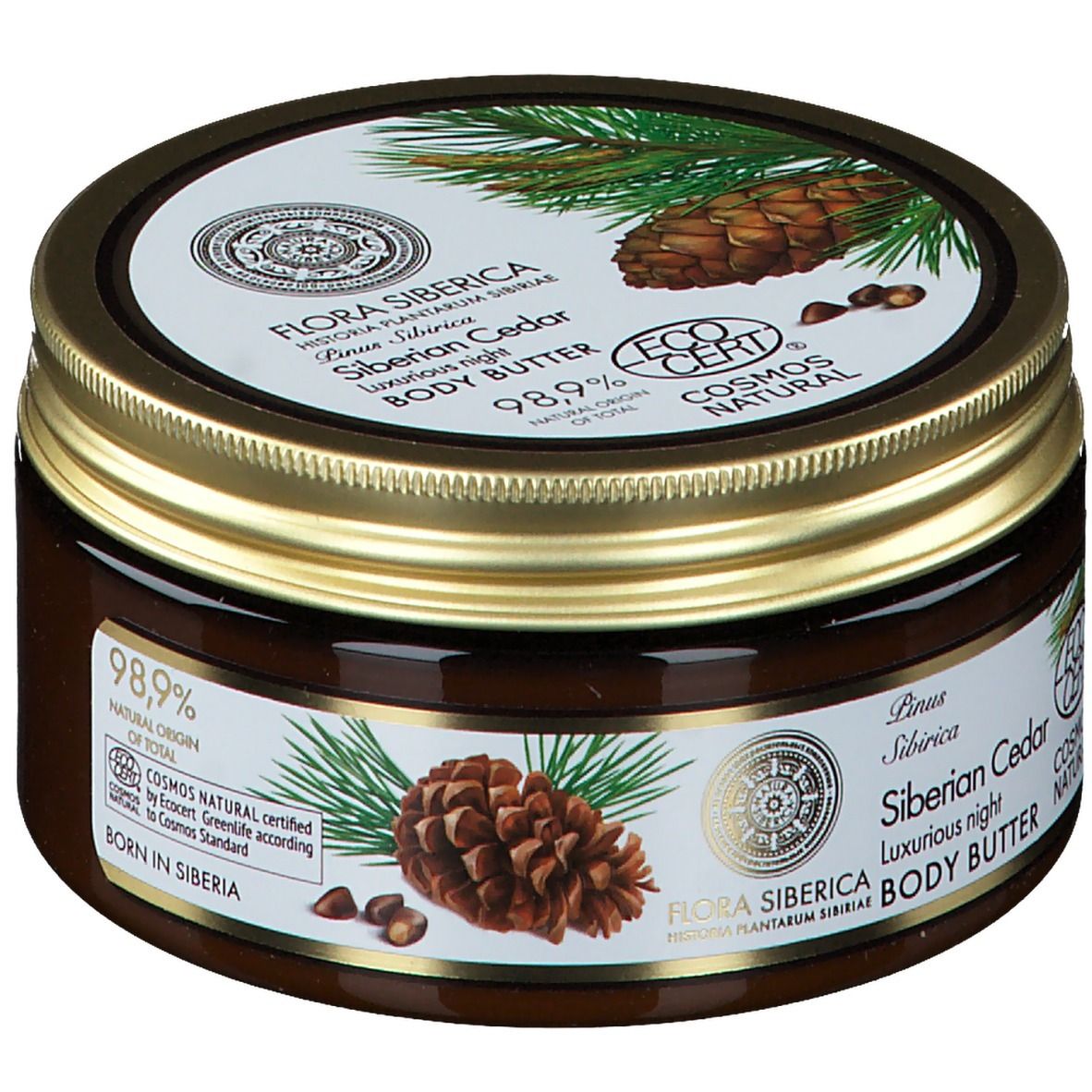 Pot brun avec couvercle doré. Inscription : Flora Siberica, Siberian Cedar Body Butter. Illustration de cônes de pin.