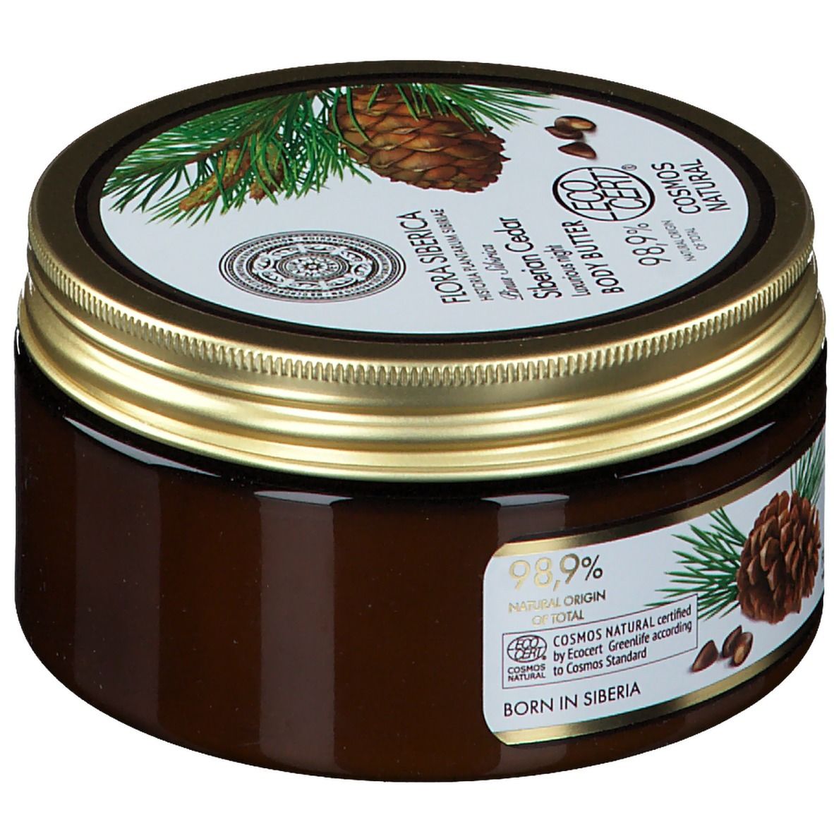 Pot brun avec couvercle doré. Inscription : Flora Siberica, Siberian Cedar Body Butter. Illustration de cônes de pin.