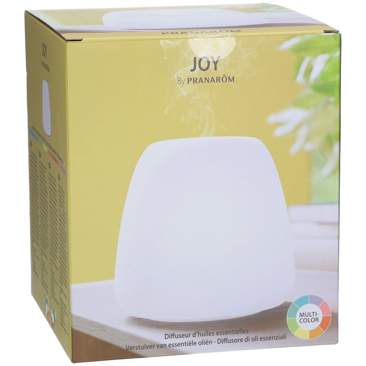 Verpakking met witte diffuser. Opschrift: JOY by Pranarôm. Meerkleurig licht.