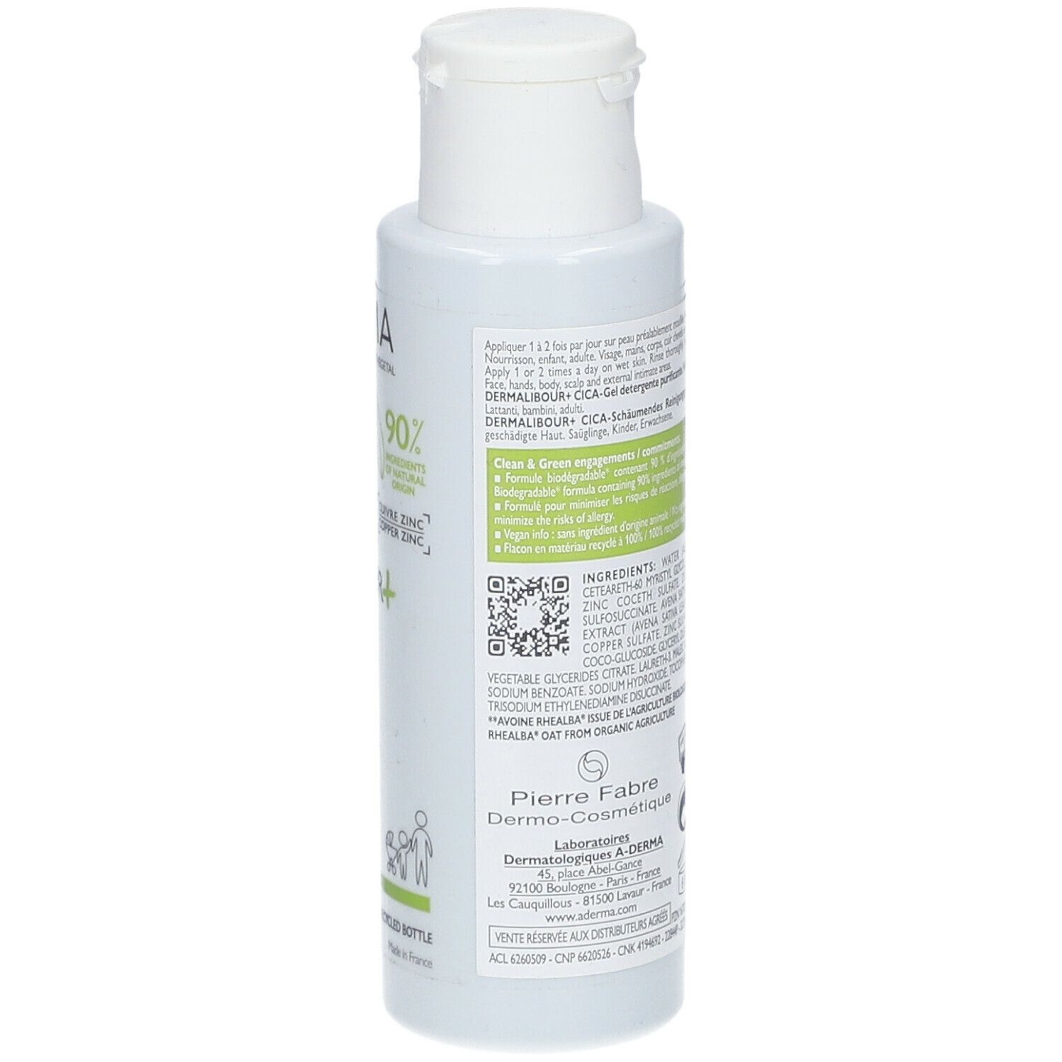 Achterkant van een witte fles. Bevat gebruiksaanwijzingen, ingrediënten, QR-code en fabrikantinformatie. 90% ingrediënten van natuurlijke oorsprong.