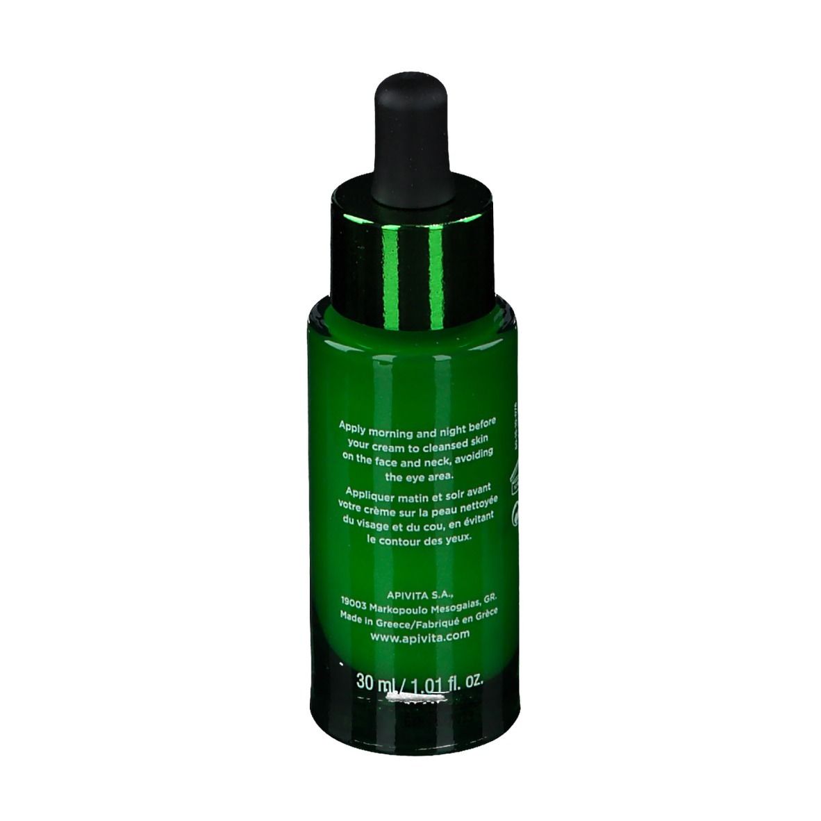 Groene glazen fles met zwarte druppelaar. Opschrift: APIVITA, BEE RADIANT, Serum. Tekst op achterkant.