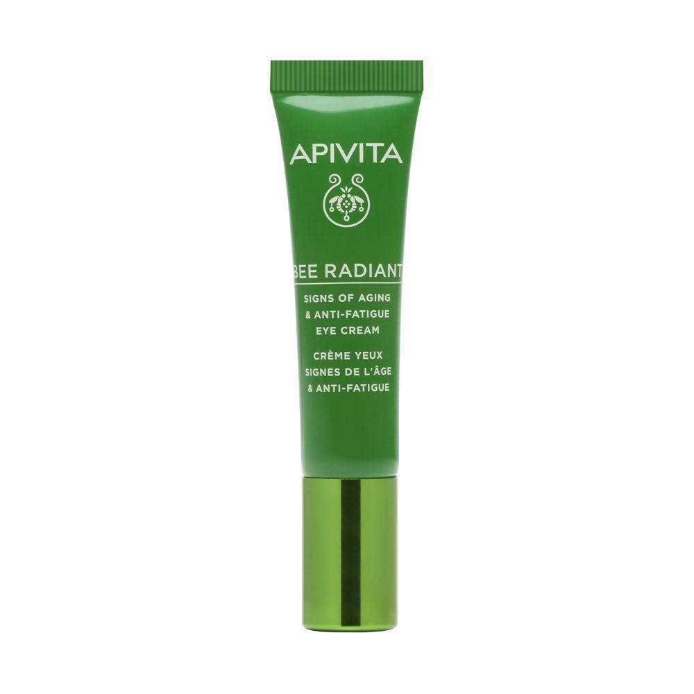 Tube vert de crème pour les yeux. Texte: APIVITA, BEE RADIANT, Signs of Aging & Anti-Fatigue Eye Cream.