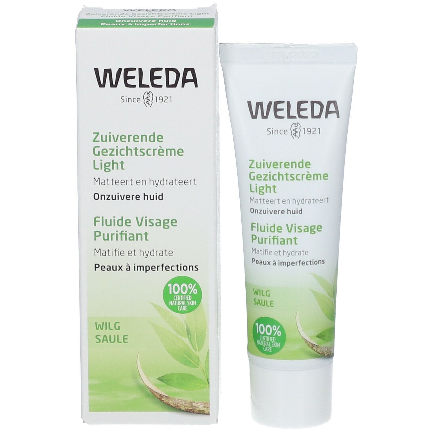 Productverpakking: tube en doos. Tekst: Weleda, Zuiverende Gezichtscrème Light, Fluiide Visage Purifiant. Certificering.