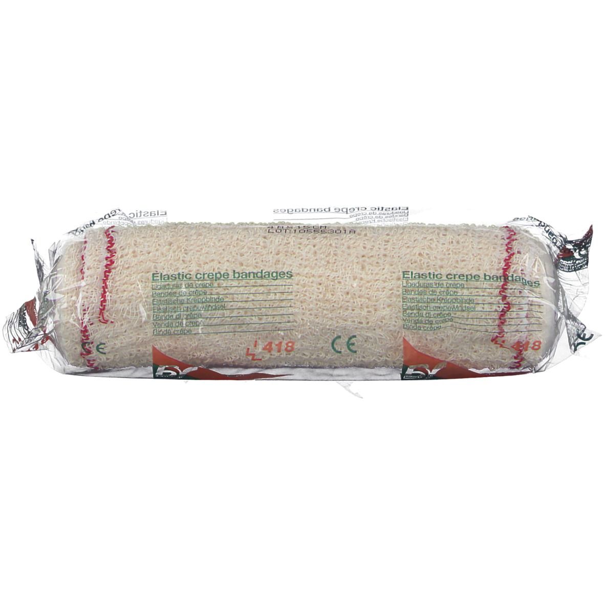 Elastische Kreppbinde in Folie verpackt. Beige, gerollt. Aufschrift: Elastic crepe bandages, CE-Zeichen.