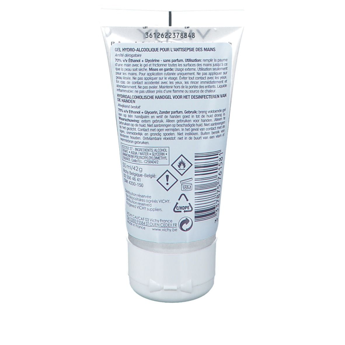 Achterkant van een tube met witte dop. Tekst in meerdere talen. Waarschuwingen en barcode.
