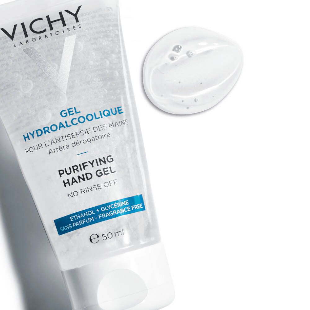 Tube met witte dop en transparante gelproef ernaast. Opschrift: VICHY, GEL HYDROALCOHOLIQUE, PURIFYING HAND GEL.