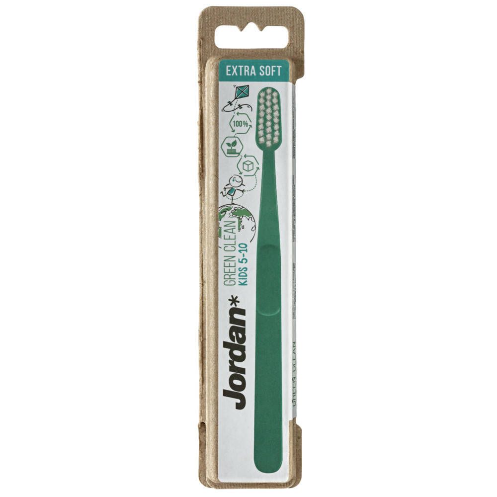 Brosse à dents verte pour enfants, emballage carton. Marque Jordan Green Clean, extra souple. Soies blanches, manche vert.