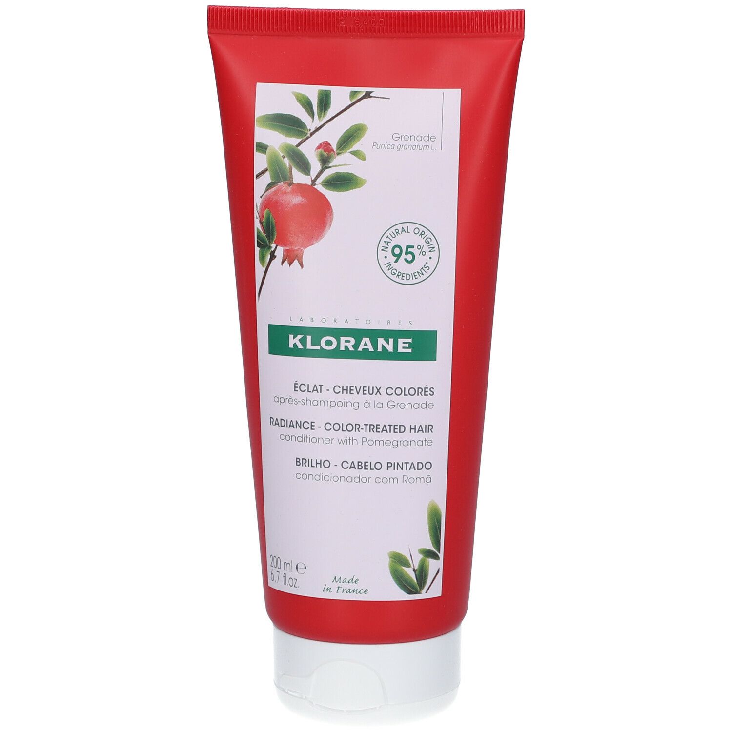 Rode tube Klorane Radiance Conditioner Granatapfel. Illustratie van granaatappelplant. Tekst: Eclat, Cheveux colores.