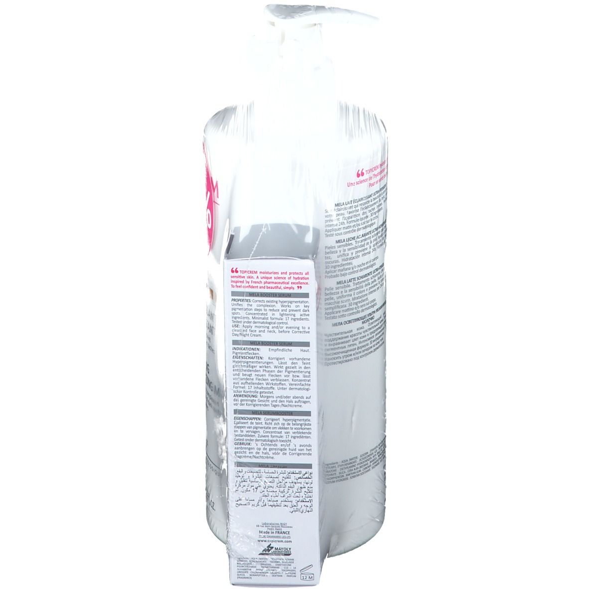 Achteraanzicht van TOPICREM MELA bodylotion en serum. Tekst op de achterkant van de fles en het serum. Verpakt in folie.