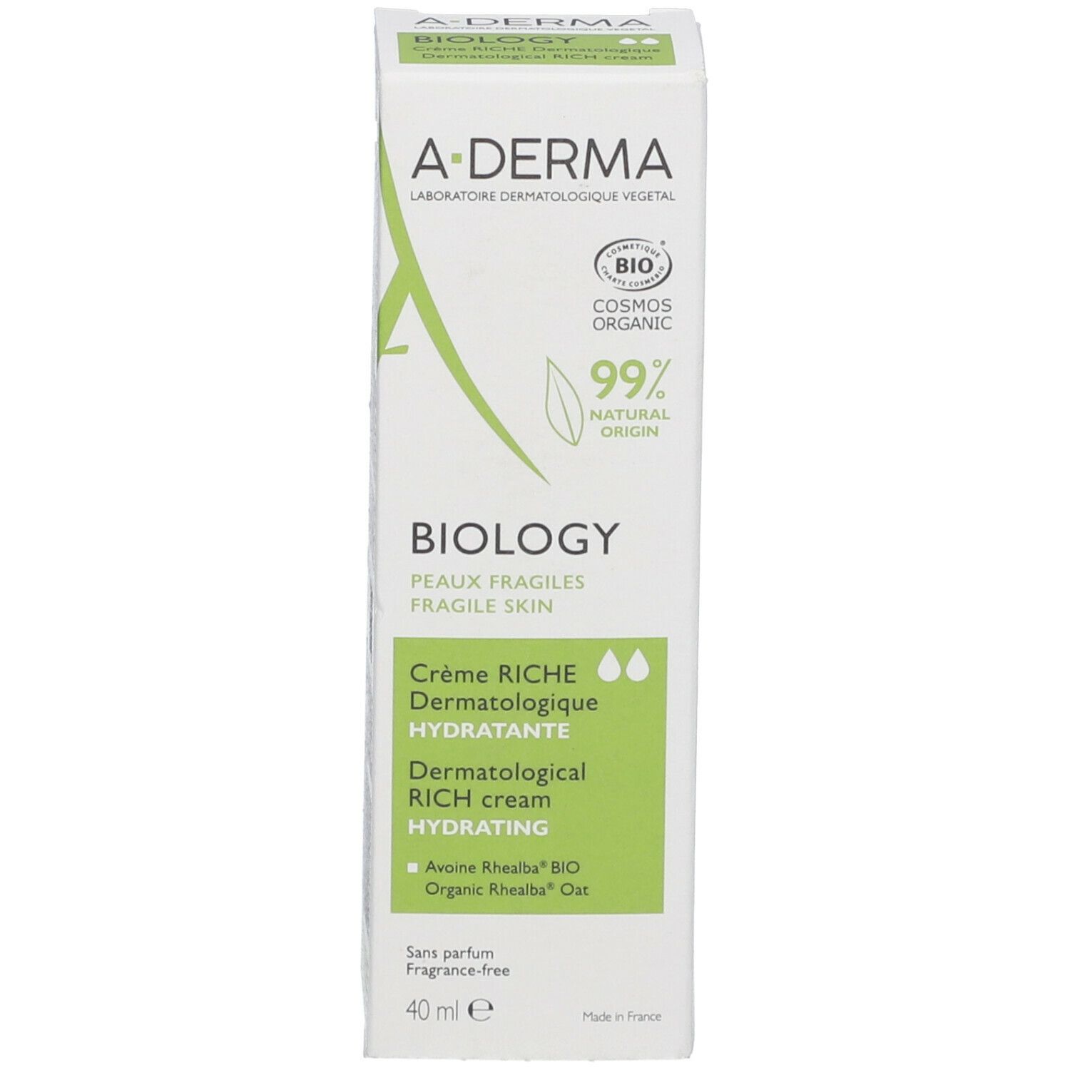 A-Derma Biology crème verpakking. Wit met groene accenten. Tekst: Biology, Crème Riche, Dermatologique Hydratante, 99% natuurlijke oorsprong.