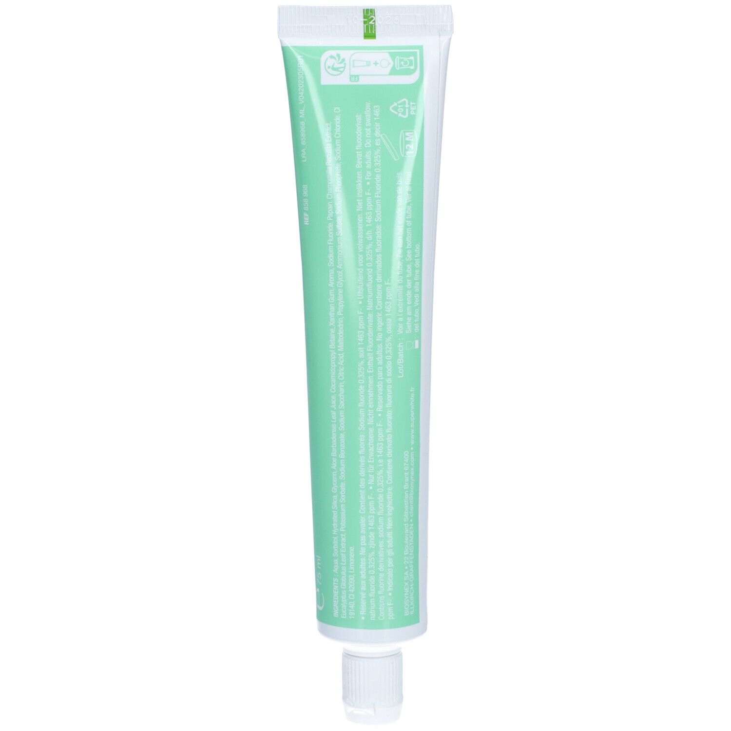 Dos d'un tube de dentifrice vert et blanc. Texte et symboles.