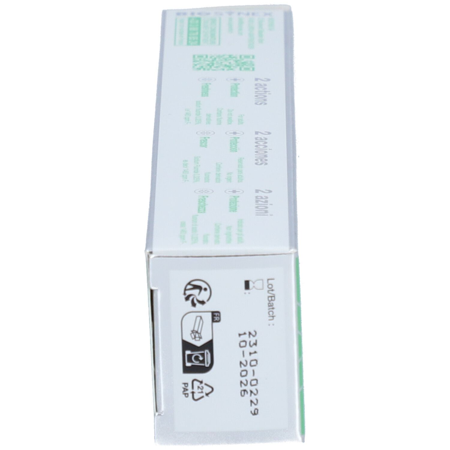Boîte, vert et blanc. Côté avec texte, symboles et numéro de lot.