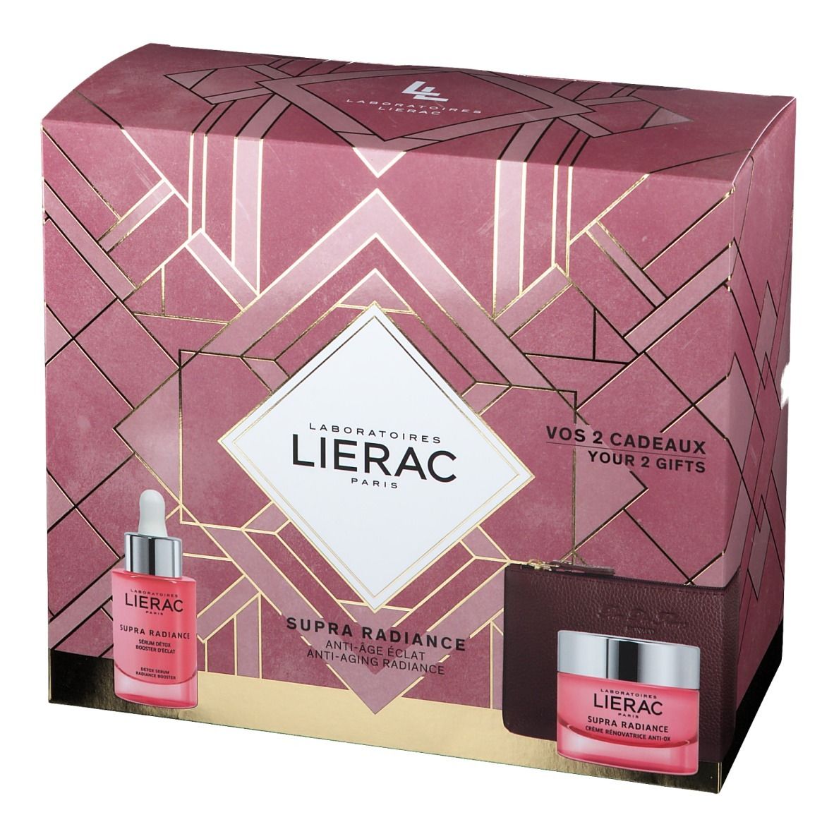 Geschenkset met serum, crème en toilettas. Roze verpakking met logo en productnamen. Zichtbare teksten.