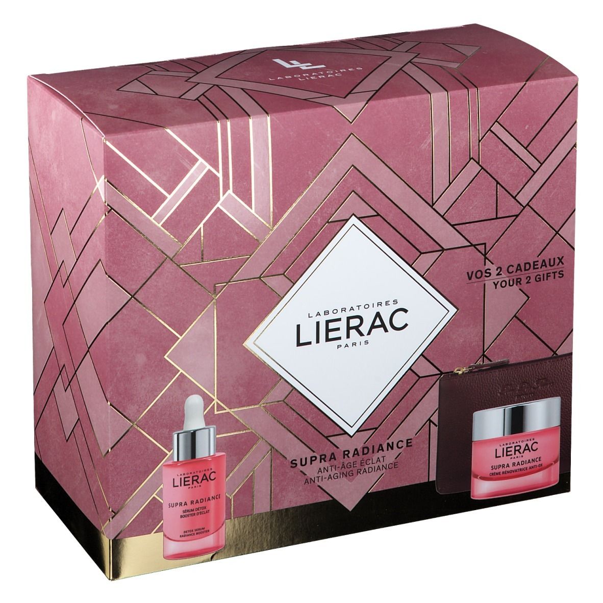 Geschenkset met serum, crème en toilettas. Roze verpakking met logo en productnamen. Zichtbare teksten.