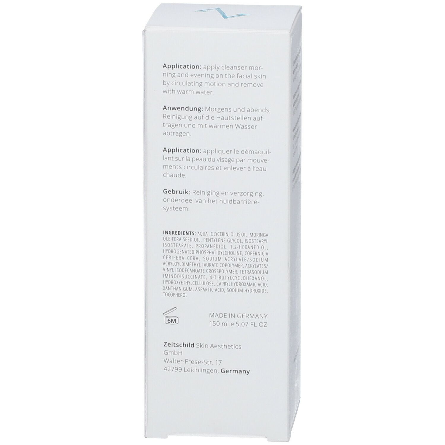 Emballage blanc. Inscription: Application: appliquer le démaquillant sur la peau du visage par mouvements circulaires et enlever à l'eau chaude. Ingrédients et logos.