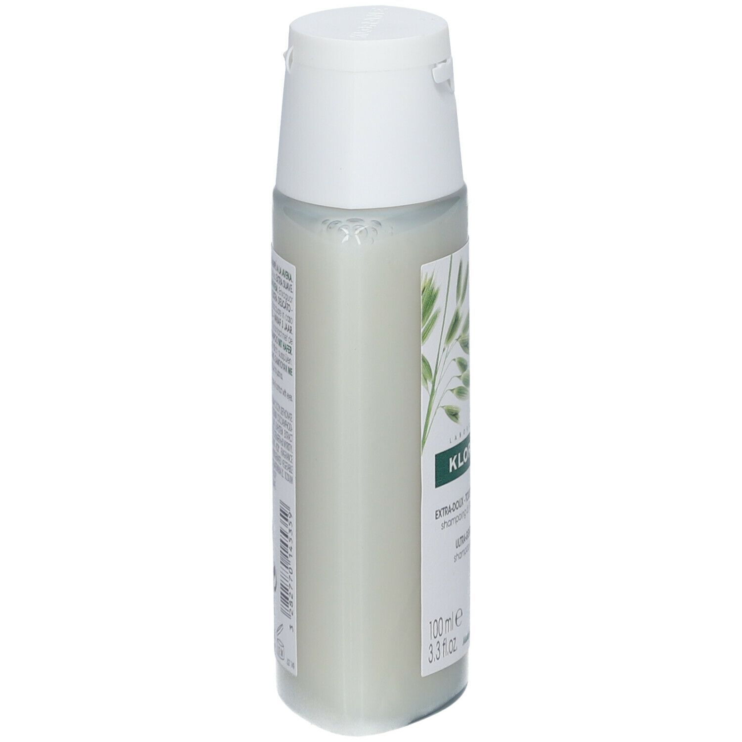 Flacon de shampooing Klorane à l'avoine. Vue latérale. Bouchon blanc, étiquettes vertes et blanches. 100 ml.