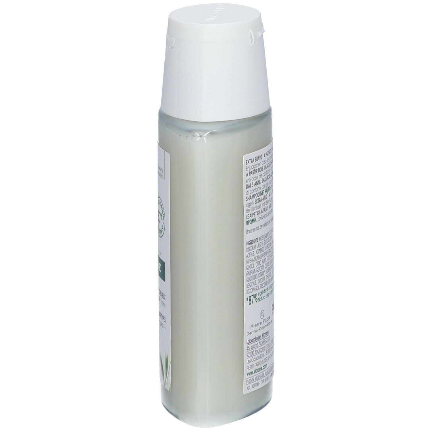 Flacon de shampooing Klorane à l'avoine. Vue arrière. Bouchon blanc, étiquette avec ingrédients et informations.