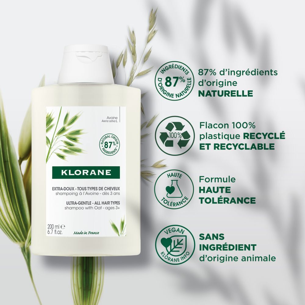 Dos du flacon de shampooing Klorane. Texte avec informations produit, ingrédients et certifications. Design blanc.