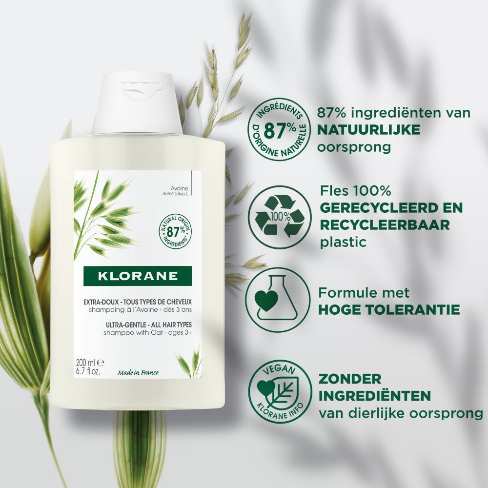 Klorane shampoo fles. Voorkant met productnaam, logo en ingrediënten. Wit ontwerp met witte dop.