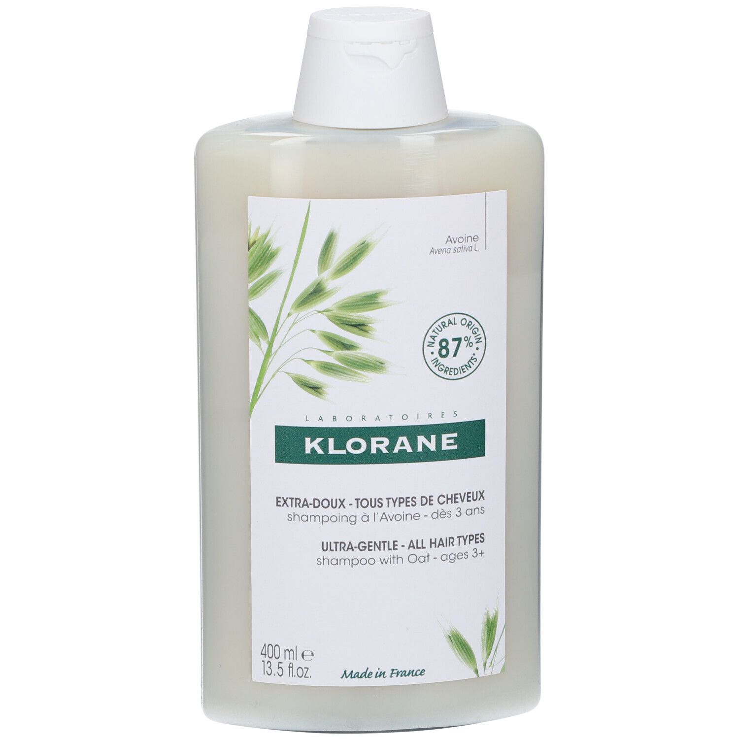 Klorane Shampoo Hafermilch Flasche. Weiße Flasche mit grünem Etikett. Text: Extra-Doux, Tous Types de Cheveux, Ultra-Gentle.