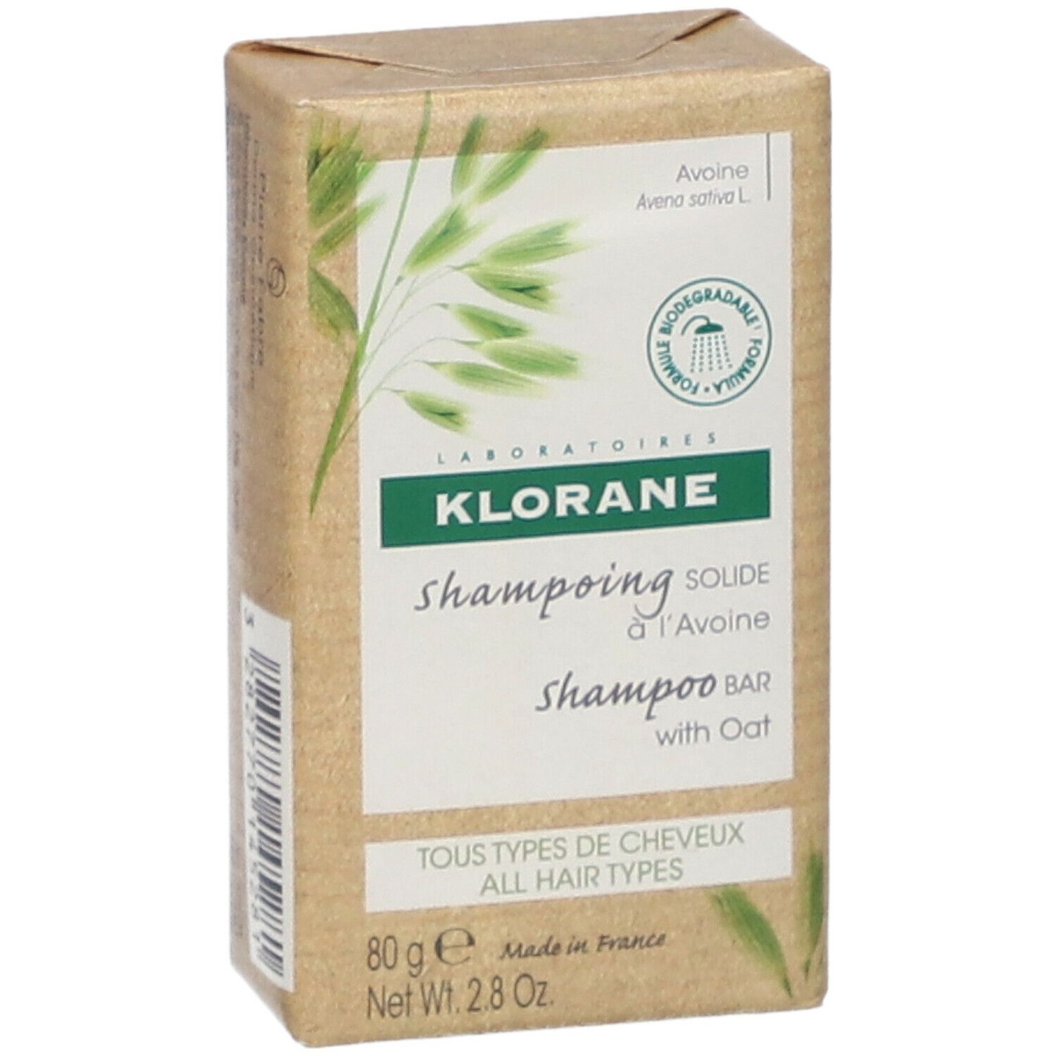 Klorane Shampoo Bar. Rechthoekige verpakking van bruin papier. Opschrift: Shampooing solide à l'Avoine, met haver. Alle haartypes.