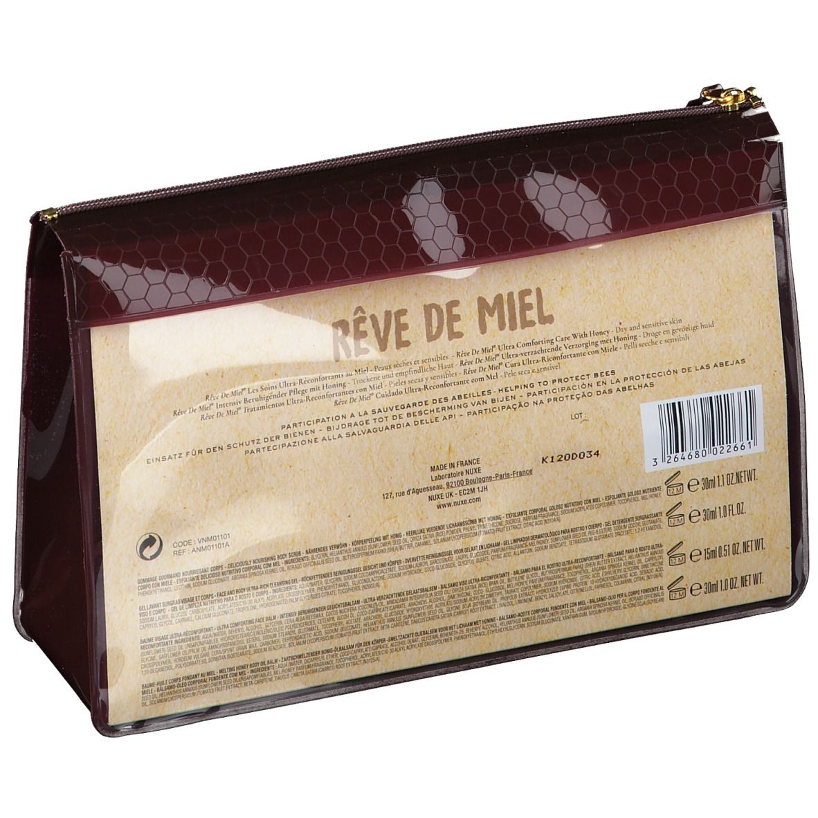 Achterkant van de make-uptas. Bevat productinformatie en barcode. Merk NUXE. Tekst: Rêve de Miel.
