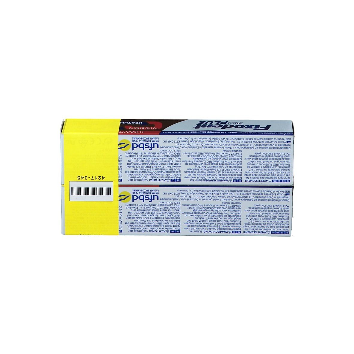 Achterkant van de Fixodent Pro Plus verpakking. Tekst en barcode op gele achtergrond. Productnaam en logo zichtbaar.