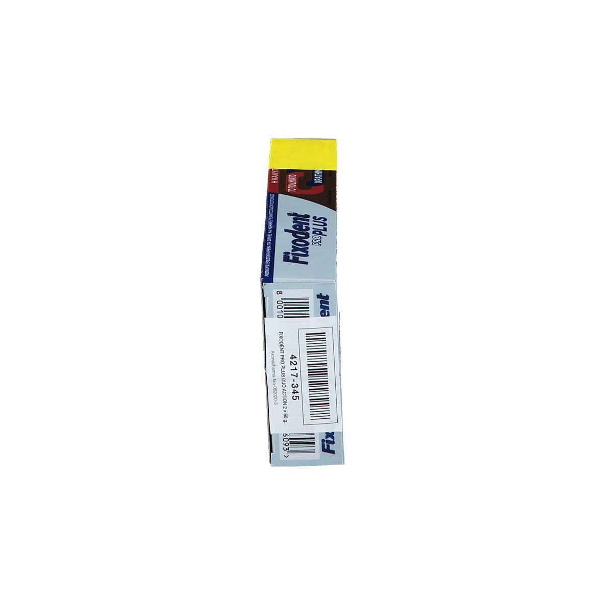 Zijaanzicht van de Fixodent Pro Plus verpakking. Gele promo-doos met tekst en barcode. Productnaam en logo zichtbaar.