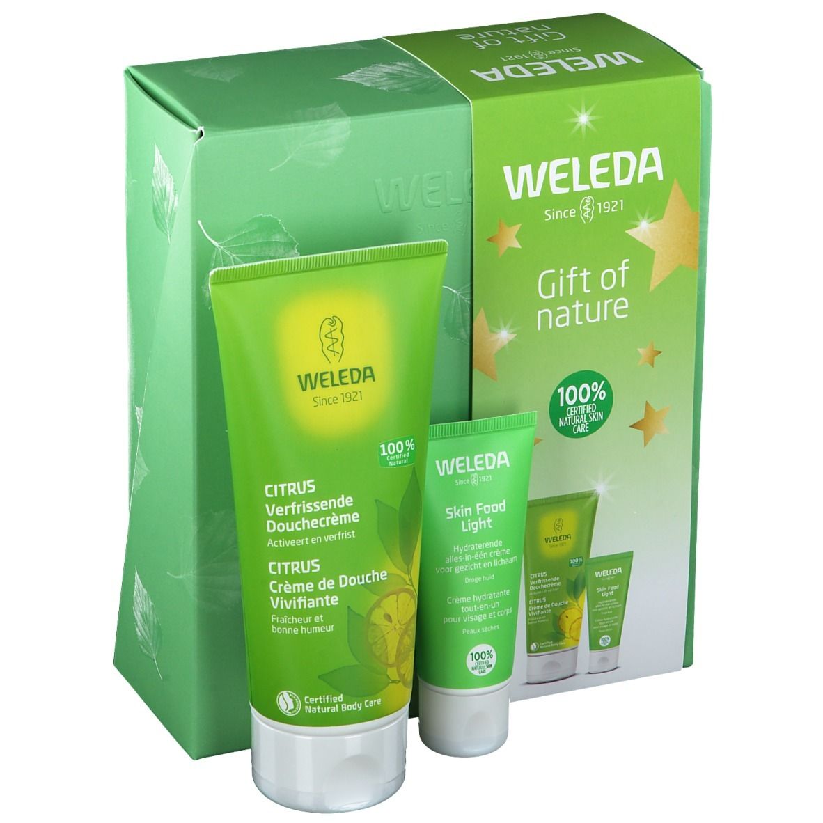 Geschenkset met twee tubes en een doos. Opschrift: WELEDA, Citrus, Skin Food Light. Groen en wit.