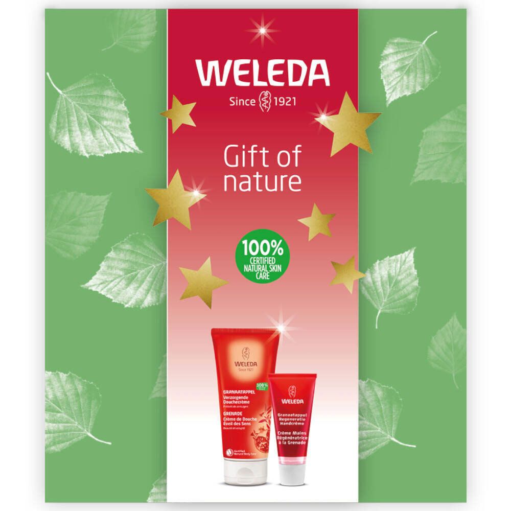 Cadeauset met twee tubes. Rode tubes met witte dop. Opschrift: WELEDA, Gift of nature, 100% Certified Natural Skin Care. Sterren.