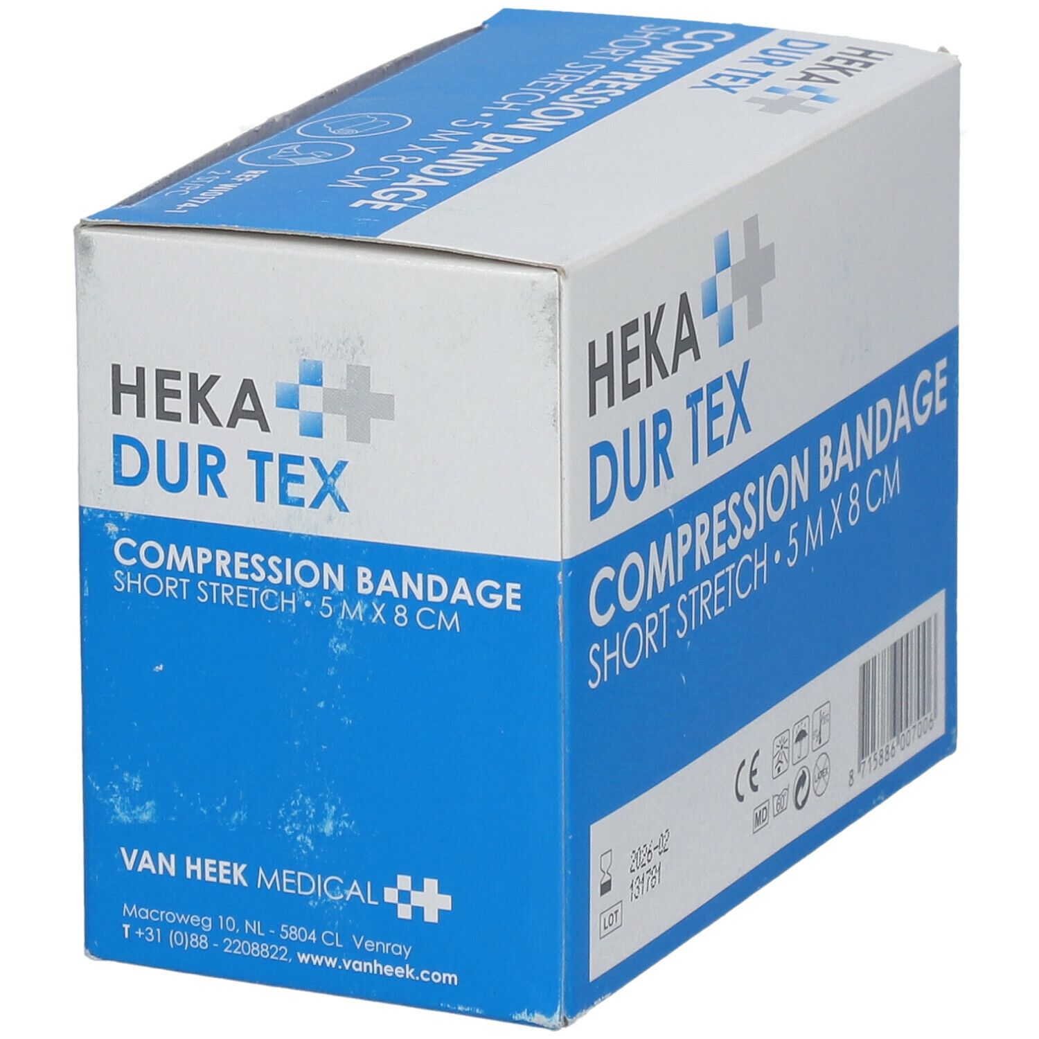 Kartonnen verpakking met HEKA DUR TEX compressieverband. Opschrift: COMPRESSION BANDAGE SHORT STRETCH 5 m x 8 cm. Met fabrikantenadres.