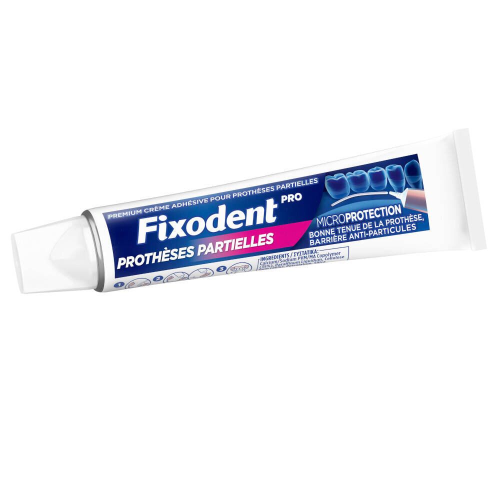 Tube blanc Fixodent Pro. Texte: PROTHÈSES PARTIELLES. Inscription: MICROPROTECTION.