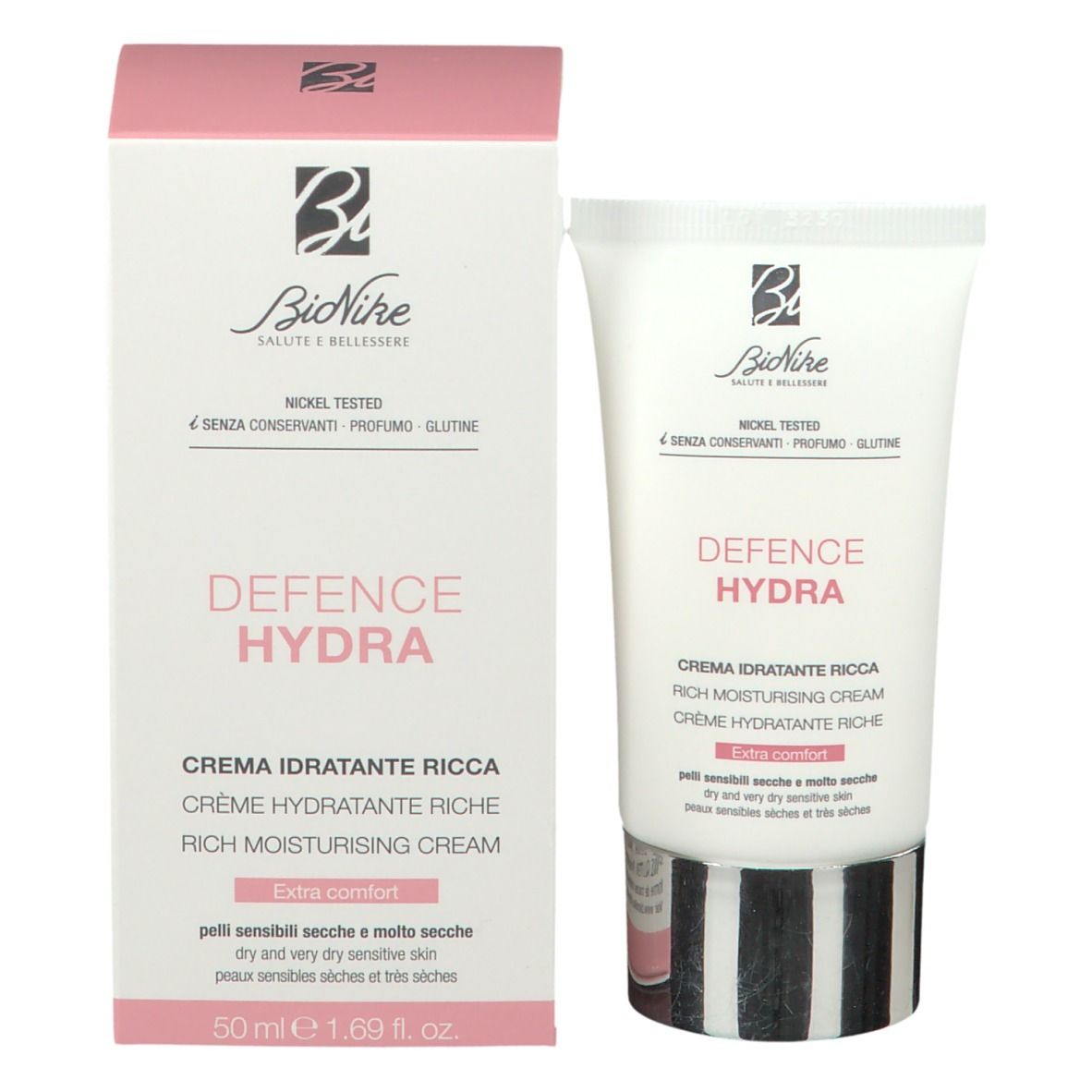 Product en verpakking. Witte tube en roze doos. Opschrift: "DEFENCE HYDRA".