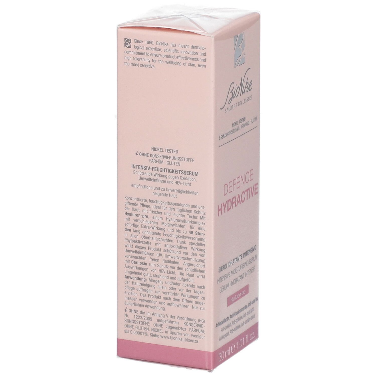 Boîte rose BioNike DEFENCE HYDRACTIVE. Sérum hydratant intensif, 30 ml. Logo et texte. Texte au dos. Sans conservateurs, parfum, gluten.