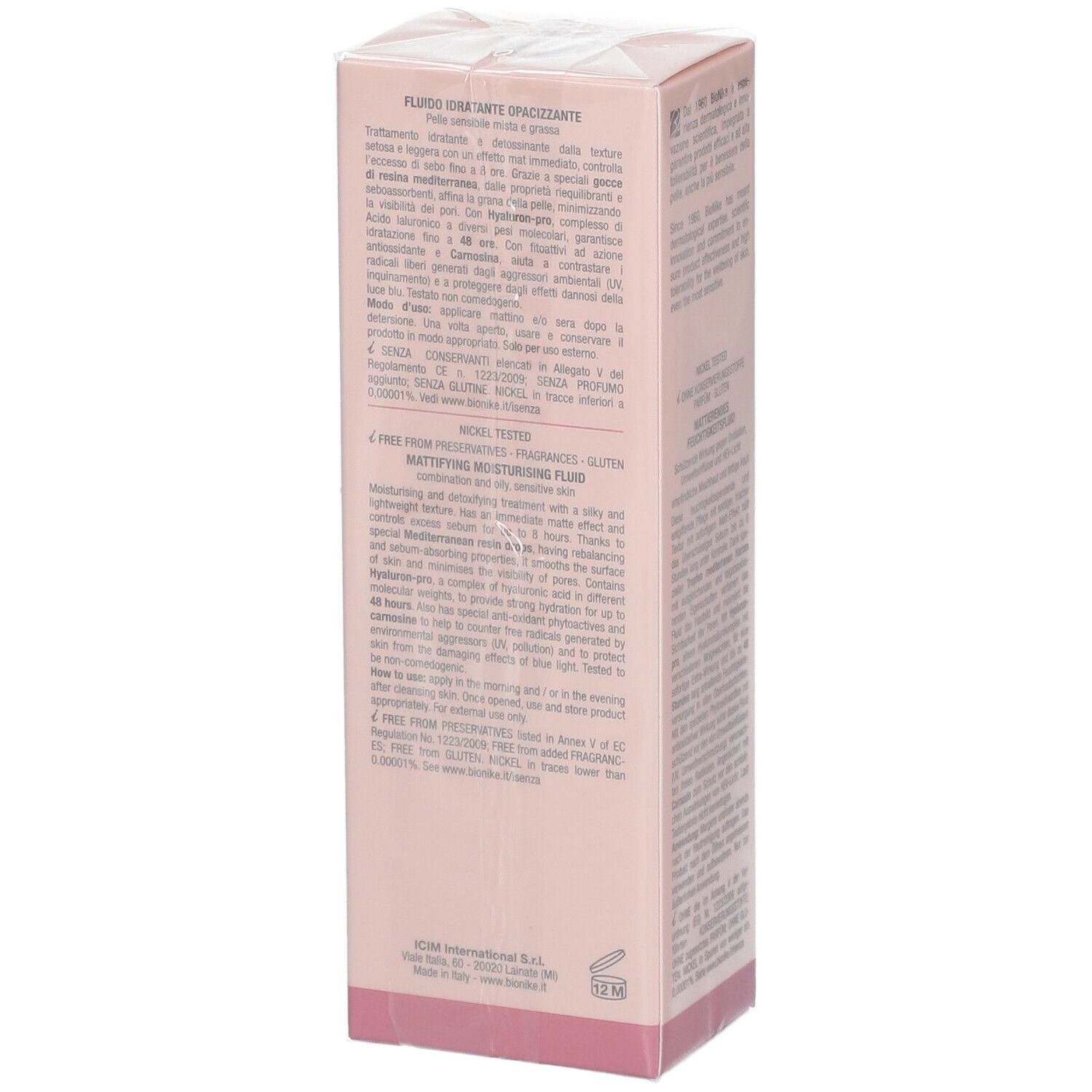 Roze verpakking, productnaam en merk zichtbaar. Tekst: DEFENCE HYDRACTIVE, FLUIDO IDRATANTE OPACIZZANTE, 40 ml. Detailweergave.