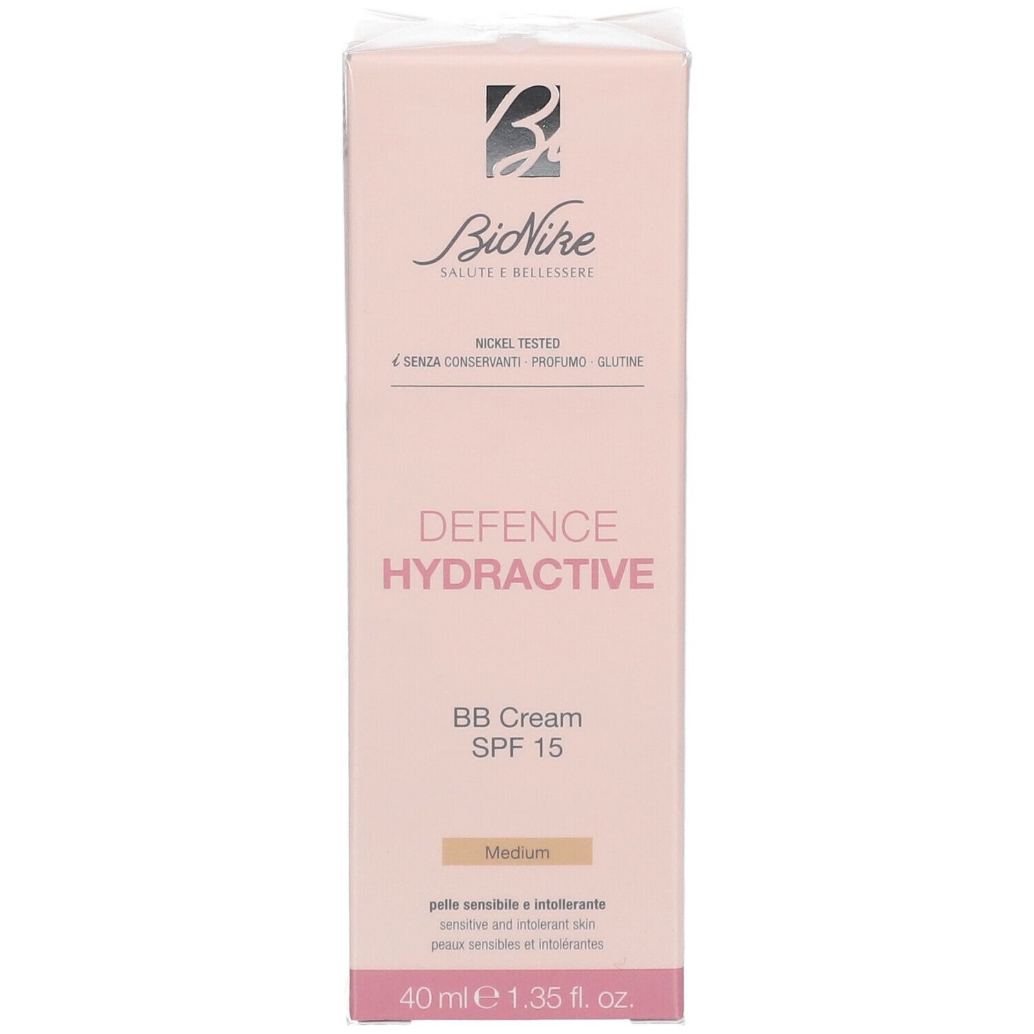 Roze verpakking van BioNike DEFENCE HYDRACTIVE BB Crème SPF15 Medium. Tekst: Nickel Tested, 4 zonder conserveermiddelen, parfum, gluten. 40 ml.