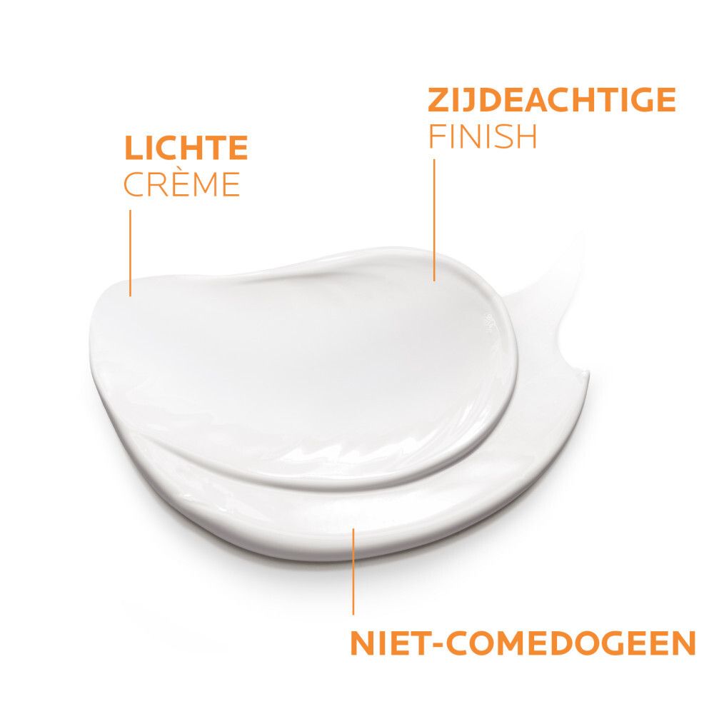 Textuur van La Roche-Posay Anthelios Age-Correct Crème de Jour Légère SPF50. Crème, tekst, niet-comedogeen.