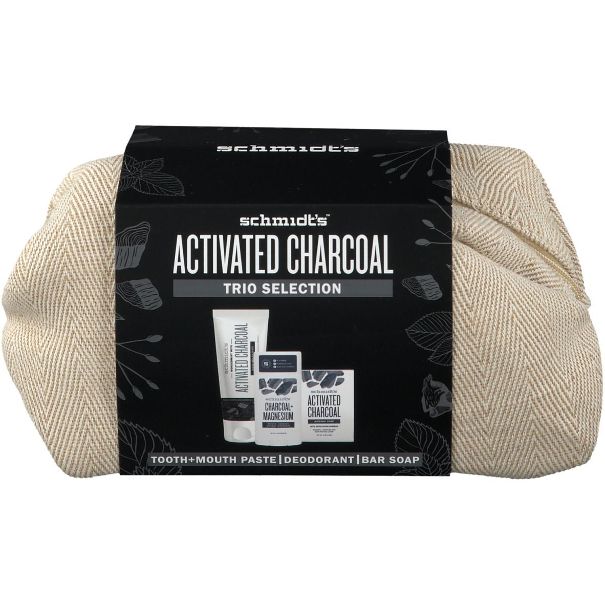 Geschenkset met actieve koolproducten. Bevat tandpasta, deodorant en zeep. Beige tas met ritssluiting.