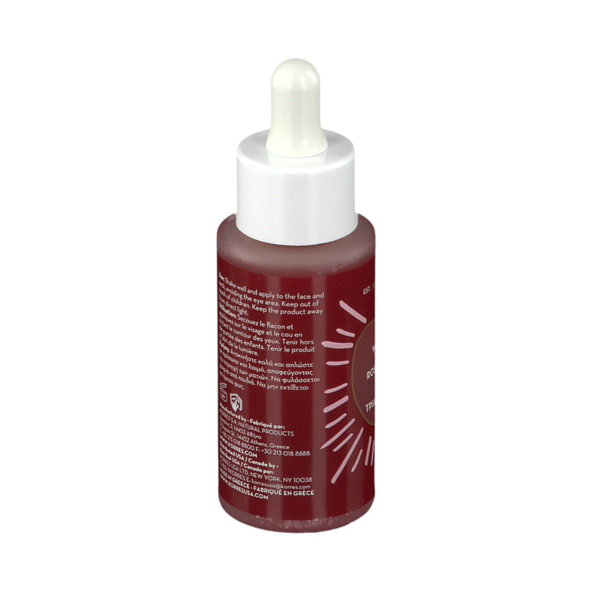 Achterkant KORRES Wild Rose fles. Tekst over gebruik en ingrediënten. Glazen fles. Meertalige informatie.